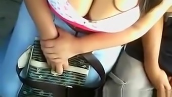 Huge boobs and cleavage at the bus