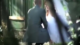 Bride caught with man peeing outdoors