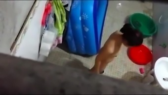 Spying on Thai neighbor taking a bath outside