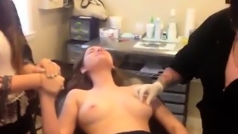 Young Girl gets Nipples Pierced