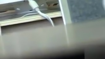 Hairy pussy upskirt in a college computer lab