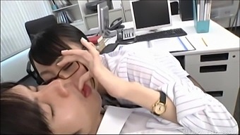 Japanese boss girl gives a rim job to a dude on the table in her office