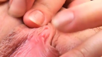 Cuddly chick is spreading narrow vagina in closeup an62qXP