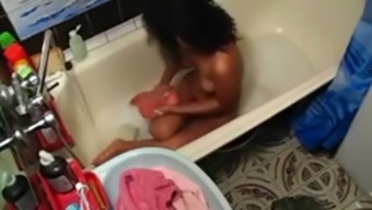Nice girl caught masturbating in bath