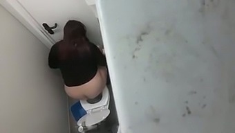 Hidden cam video of slutty natural bitch flashing ass in public toilet