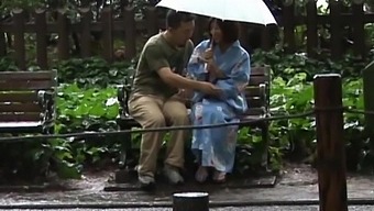Outdoors video of a shy Japanese babe getting fingered by a stranger
