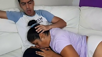 My stepmother gives me a delicious blowjob while we watch a movie