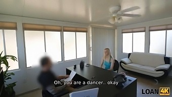 LOAN4K. Dancer shows the bank manager how well she can move her body