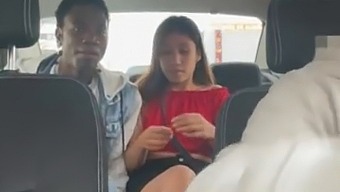 Hidden camera records a young couple fucking in a taxi