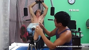 If you love male foot tickling, youll love this one! Cute Asian boy Argie comes to exercise at the gym with his trainer. The gym trainer convinces Argie that he must be secured at the gym for this vigorous leg workout.
