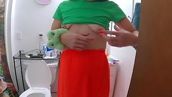 Long pussy, transparent orange skirt, tight green t-shirt, massive piercing with light. Happy autumn!