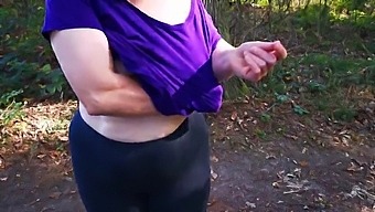 MILF's big tits get spanked in the great outdoors