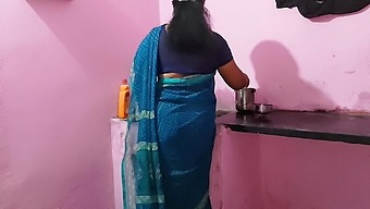 Desi couple's kitchen sex with a muscular woman