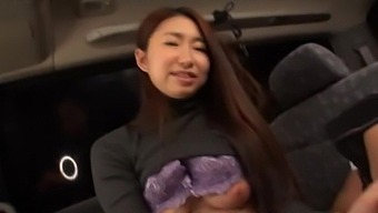 A Japanese girl drawing a manhood in the car in HD POV video.