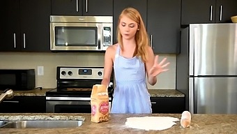 HD video of Hannah Hays, a blonde 18-23 teen with small breasts, fingering herself in the kitchen