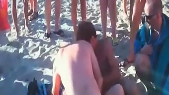 Wife swapping and wife sharing at a swingers club on the beach